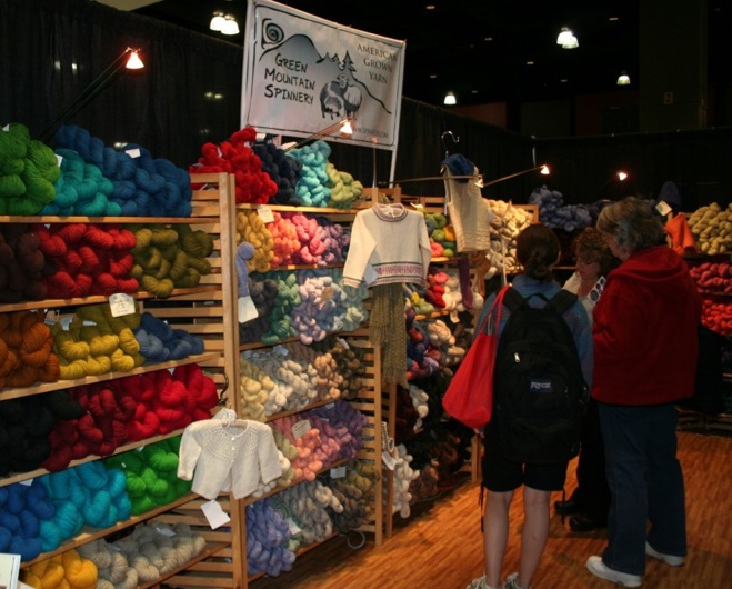 A yarn consult at the Green Mountain Spinnery booth, Stitches East in Hartford, Connecticut. Moo Dog Knits.